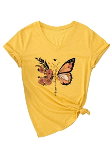 Detail of yellow V-neck T-shirt with butterfly floral print and stylish front hem knot