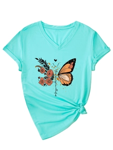 Detail of V-neck mint t-shirt with butterfly graphic and magic quote tie-front hem
