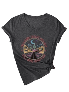 Detail of V-neck dark grey t-shirt with retro desert highway print and knotted hem style