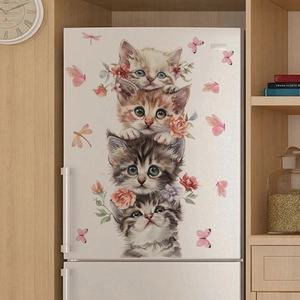 Detailed view of cute stacked kittens and flower wall stickers on a white refrigerator