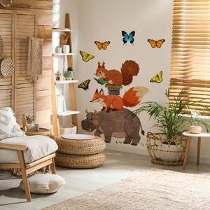 Hand-painted forest animals wall stickers featuring a hippo fox and squirrel in a kids room