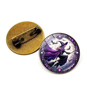 Vintage Halloween witch brooch with crystal glass cabochon and antique bronze pin base