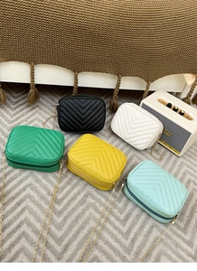 Quilted camera bags in five colors with V-stitch patterns and gold chain straps