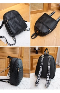 Multi-angle views of a black chevron quilted mini backpack with lettered straps