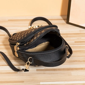 Mini sac bandoulière à motif floral vintage avec double fermeture éclair et cuir noir