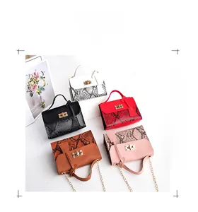 Group display of snake pattern crossbody bags with gold metal locks in five colors