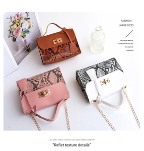 Detailed comparison of three snake-print handbags with gold twist locks and chain straps
