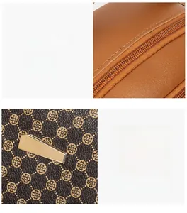 Detail of precise stitching, clover textured brown leather, and gold hardware on handbag