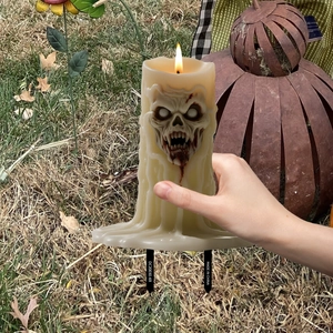 Halloween skull candle garden stake with realistic wax drip and blood details