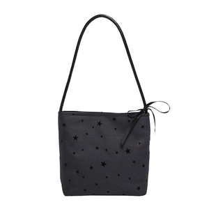 Retro charcoal polka dot hobo bag with star prints and ribbon bow accents for women