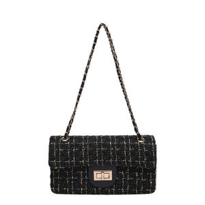 Französischer Tweed-Kettenbeutel mit schwarz-goldener Textur und Metall-Drehverschluss
