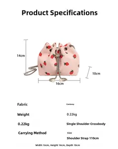 Pink corduroy bucket bag with strawberry embroidery and silver chain drawstring