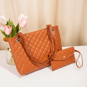 Quilted tote bag set with matching pouch in caramel brown faux leather and metal ring handles