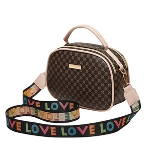 Brown monogram shell handbag with pink trim and colorful LOVE printed shoulder strap