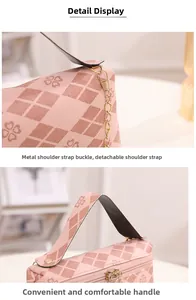 Close-up of golden hardware buckle and comfortable handle on pink clover crossbody bag