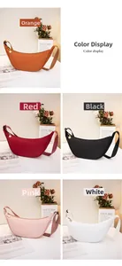 Selection of lightweight crescent crossbody bags in orange, red, black, pink, and white