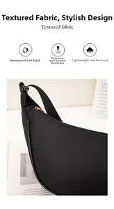 Close-up of waterproof black nylon crescent bag with durable zipper and smooth gold hardware