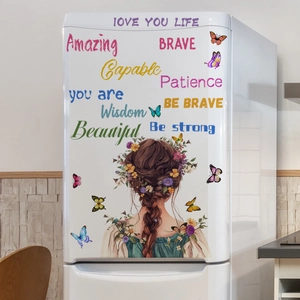 Detail of floral girl and butterfly wall decal with inspirational quotes on a white fridge