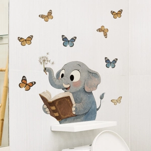 Adesivi murali elefante che legge un libro con farfalle colorate per cameretta bimbi