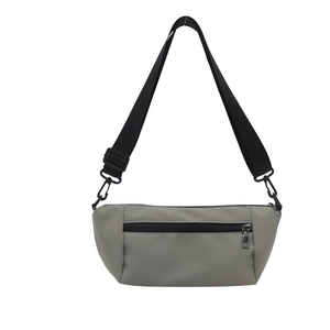 Minimalist light gray nylon crossbody bag with adjustable black strap and front zipper