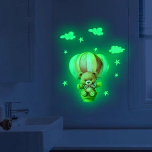 Luminous hot air balloon bear wall sticker with stars and clouds in green glow