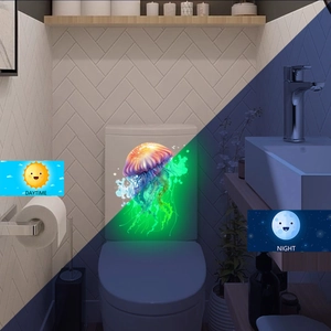 Luminous jellyfish toilet sticker showing daytime color vs glowing night effect