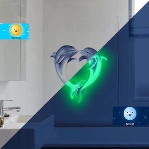 Luminous heart dolphin wall stickers showing daytime look and night green glow effect