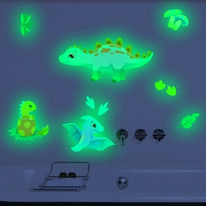 Luminous green dinosaur wall stickers showing glowing cartoon animals on a bathroom wall