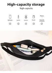 Top view of large capacity black nylon crossbody bag showing spacious inner storage space