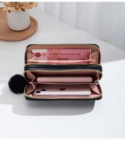 Detail view of double-layer black long wallet showing large capacity for phone and cash