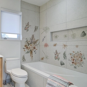 Boho floral wall decals with monstera leaves and pink dahlias for modern bathroom decor