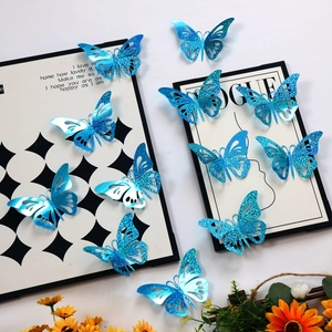 Set of 12 3D blue hollow butterfly wall stickers with sparkling laser glitter effect