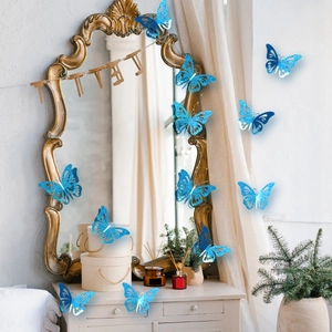 Detailed view of 3D sparkling blue hollow butterflies applied to a vintage gold mirror