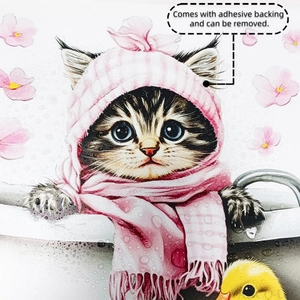 Detail of waterproof cat wall sticker with adhesive backing showing water droplets