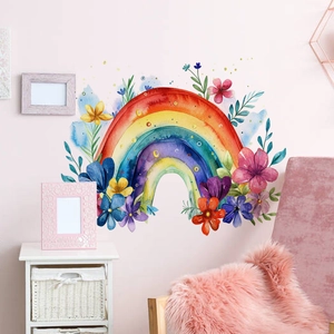 Detalle de salón con pegatinas de pared de flores arcoíris acuarela en pared rosa