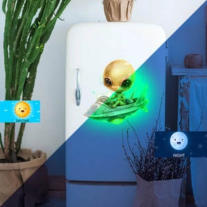 Glow-in-the-dark alien spaceship wall sticker showing day and night fluorescence