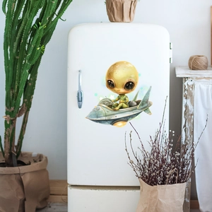 Luminous alien spaceship decorative wall sticker on a white retro refrigerator