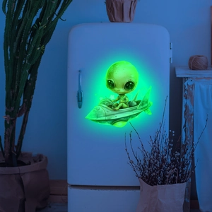 Glow-in-the-dark green alien and spaceship wall sticker for home decor on white surface