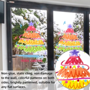 Macro detail of colorful hand-drawn Christmas tree window stickers with festive stars