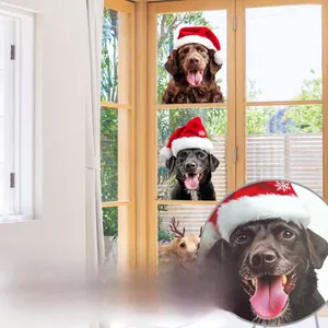 Double-sided Christmas dog window stickers featuring festive hats and reindeer antlers
