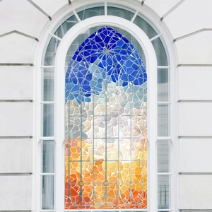Modern gradient mosaic window film with blue and orange stained glass texture for church windows