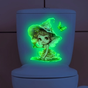 Sticker mural fée verte lumineuse avec lanterne brillant dans l'obscurité aux WC