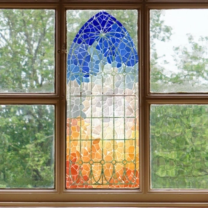 Artistic mosaic window film with vibrant blue and orange gradient church glass pattern