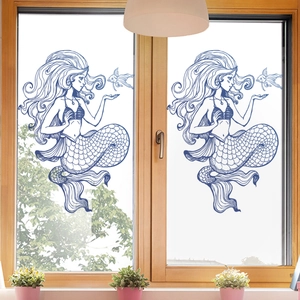 Deep blue hand-drawn mermaid window stickers on glass panels with a scenic outdoor view