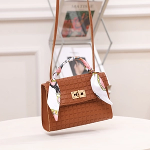 Brown checkered embossed handbag with scarf wrapped handle and gold twist lock closure