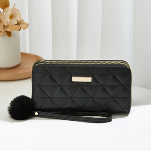Black quilted long wallet for women with double zippers and stylish plush ball pendant