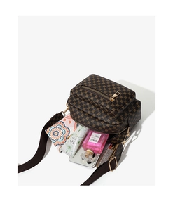Internal view of the brown vintage crossbody bag showing multi-compartment storage capacity