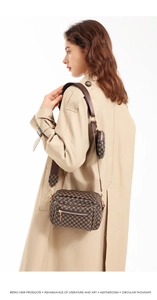 Detail of vintage patterned crossbody bag with matching round coin purse and wide strap