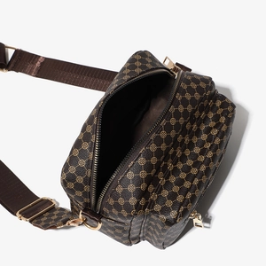 Brown vintage floral printed crossbody camera bag with adjustable strap and dual zippers