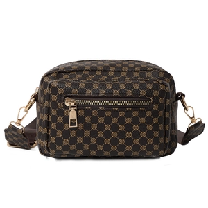 Retro brown crossbody camera bag with clover print, dual compartments and wide strap